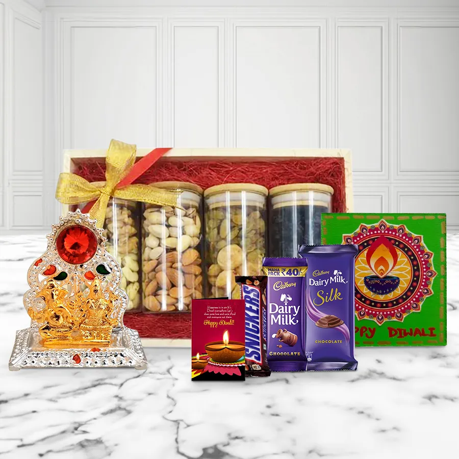 Diwali Bliss Gift Hamper featuring a wooden tray filled with premium nuts, dried fruits, Cadbury Dairy Milk Silk and Snickers chocolates, a Ganesh-Laxmi mandap, a handmade fridge magnet, and a Diwali greetings card.
