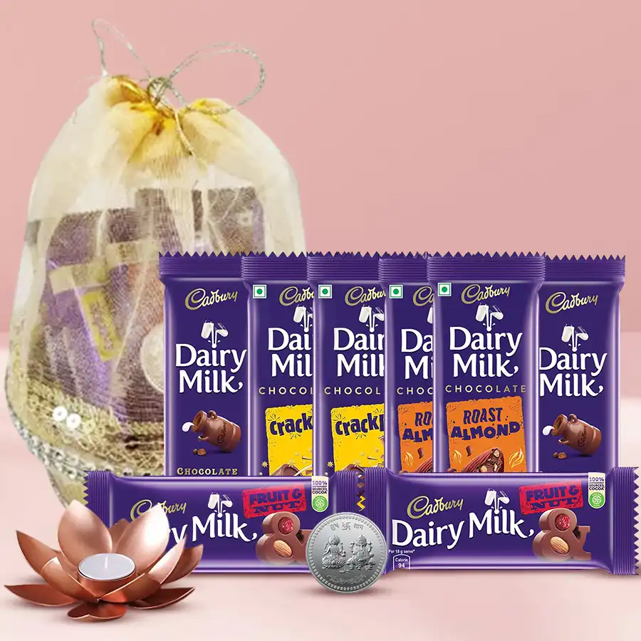 Special Cadbury Chocolates and Lotus Tea Light Hamper with decorative gift basket, featuring assorted Cadbury bars, Lotus Tea Light holders, and silver-plated Ganesh-Laxmi coin.