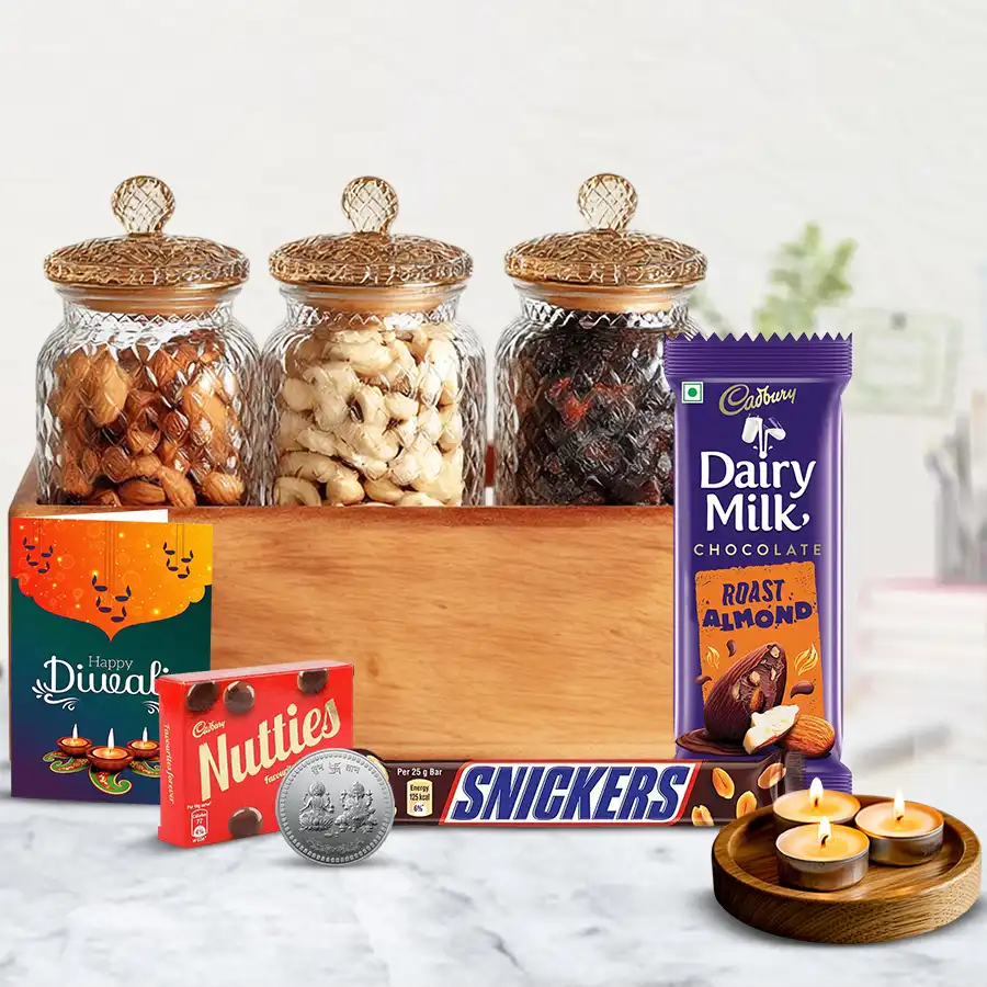 Assorted Premium Chocolates and Nuts Diwali Gift Hamper with wooden tray, glass jars filled with nuts, tea light candles, and a silver-plated Ganesh Lakshmi coin