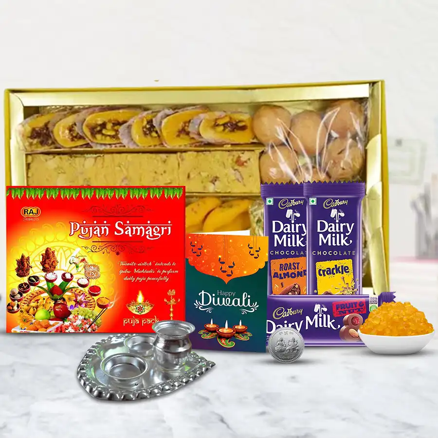 Sweet Diwali Surprise Gift Box featuring traditional sweets, Cadbury chocolates, silver-plated Pooja Thali, Ganesh-Laxmi coins, and a personalized Diwali card