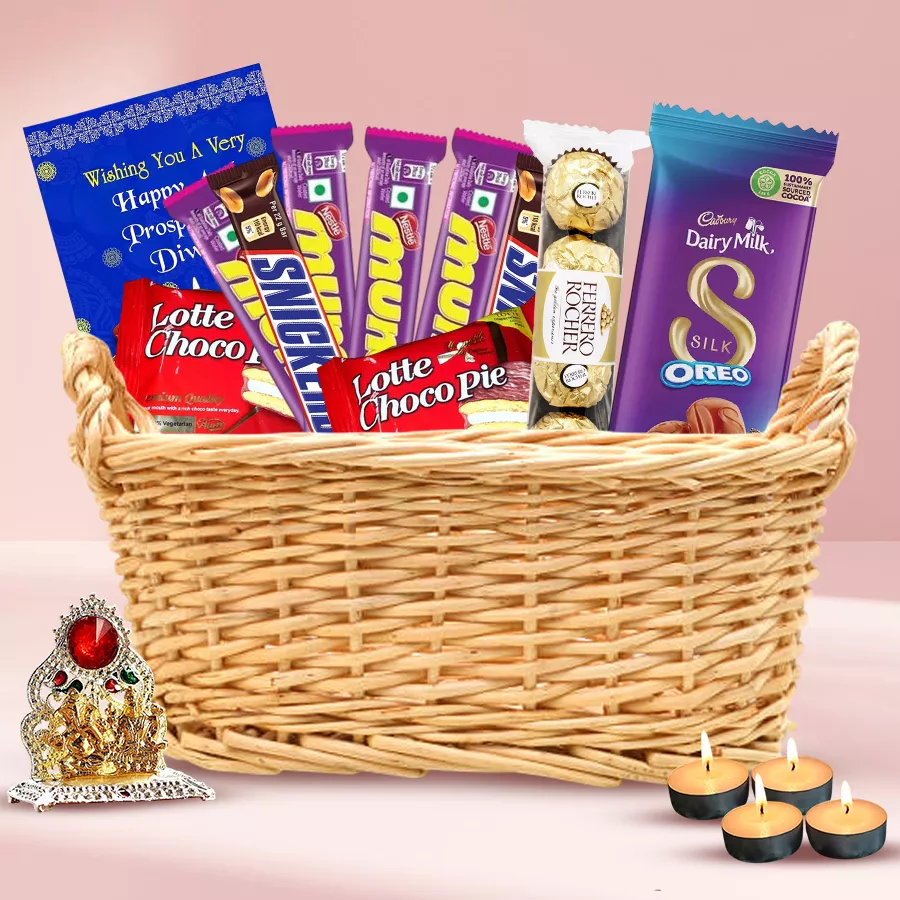 Mini Diwali Festive Delight Hamper with assorted chocolates, tea light candles, Ganesh-Laxmi mandap, and a reusable cane basket