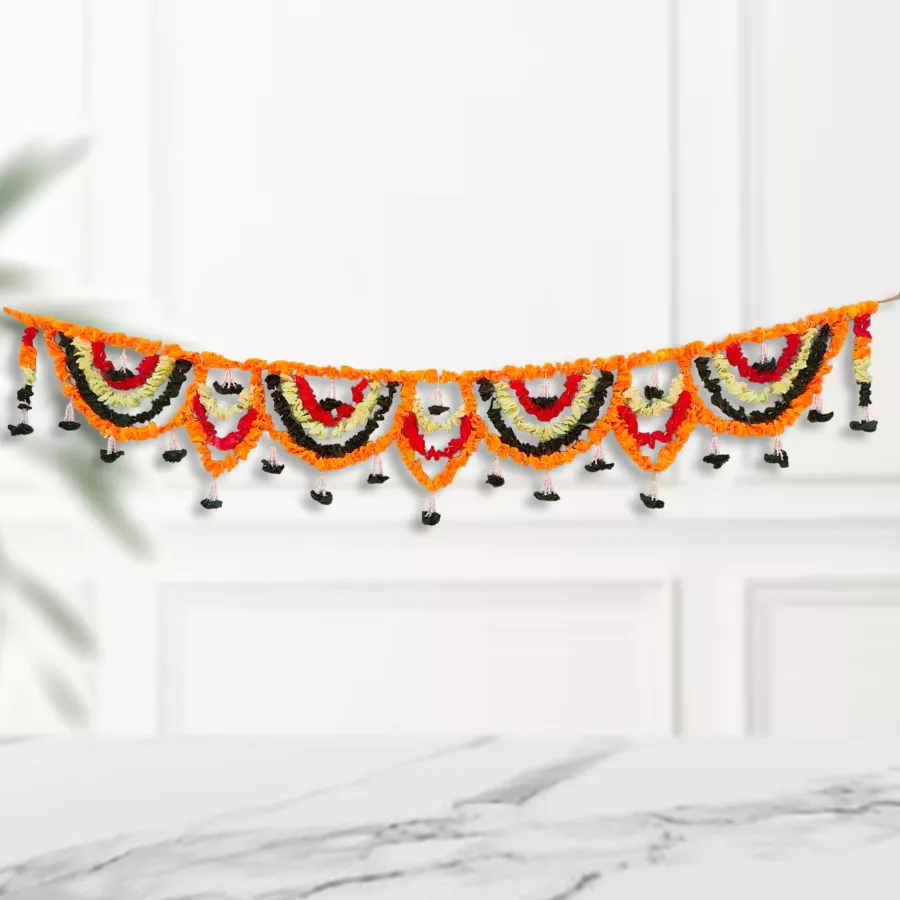 Ethnic multicolored metal door toran for Diwali celebrations, featuring intricate designs and measuring 38” x 3.5”, hung on a doorway.