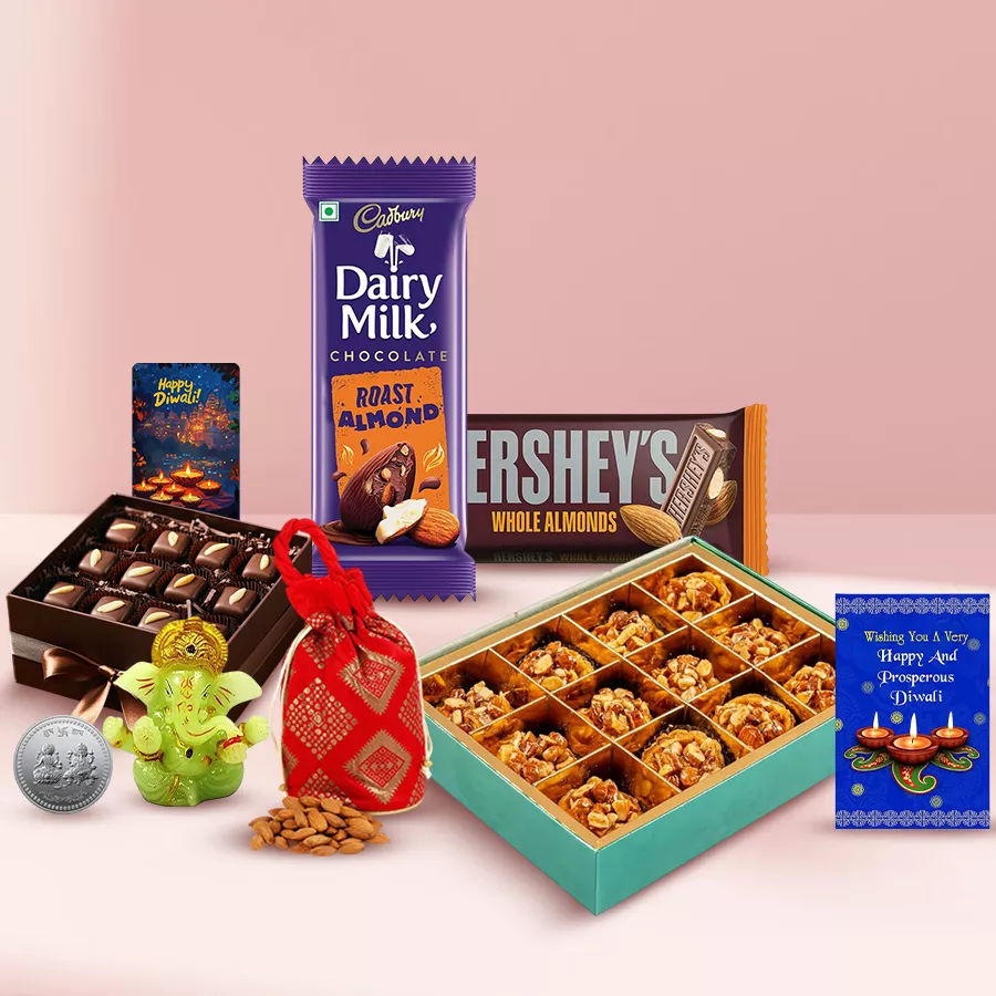 Awesome Almond Tart Baklava gift set with chocolate bars, almond bites, Ganesh idol, fridge magnet, almond potli, and Diwali card