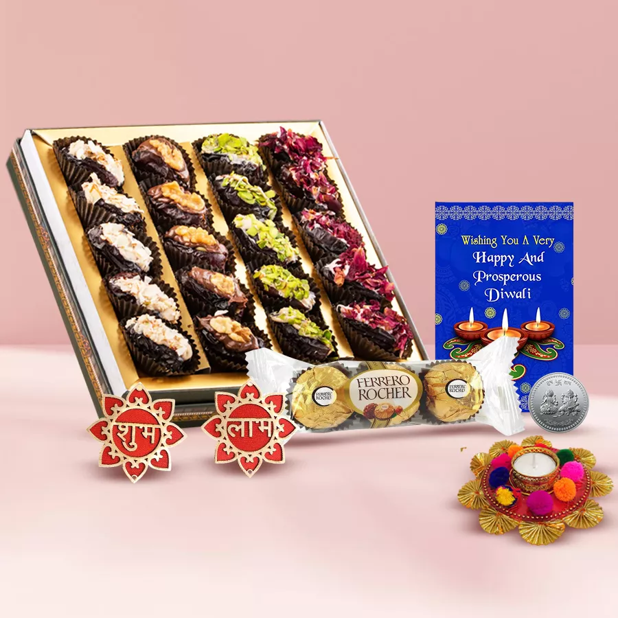 Sweet Treat Dates Baklava and Ferrero Magic hamper with festive decorations including a diya, wall stickers, and a Ganesh Lakshmi coin