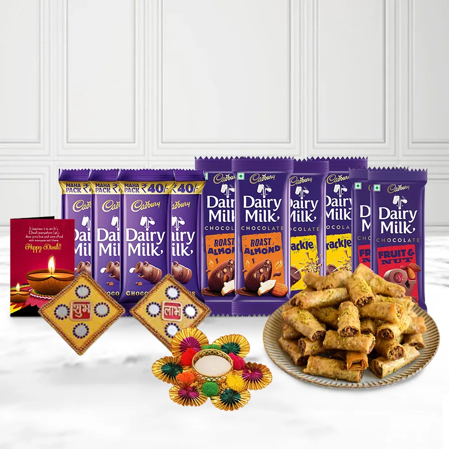 Amazing Roll Baklava Pack with Cadbury Bliss chocolates, Diwali decoration items, and a festive card
