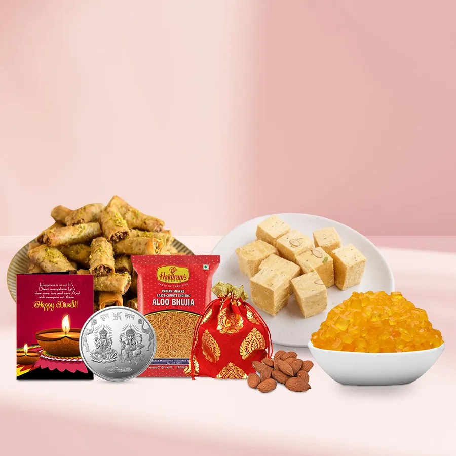 Mouthful Roll Baklava and Snack n Sweet Soan gift basket with decorative elements and Diwali card