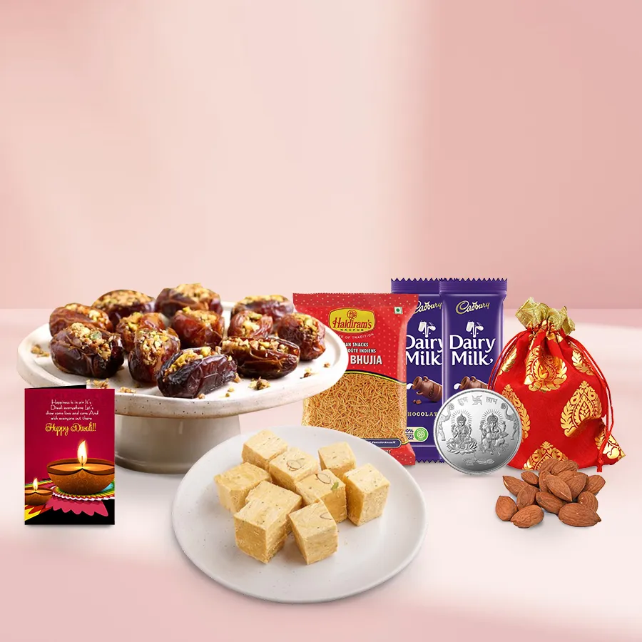 Munchy Dates Baklava and Soan n Snack Gift Basket for Diwali celebration with assorted sweets and a silver Ganesh-Laxmi coin
