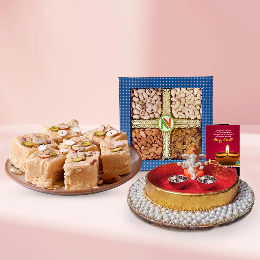 Luxe Diwali Treat Box featuring Ganesha Idol, Soan Papdi, premium dry fruits, Pearl Puja Thali, and a Diwali wishing card