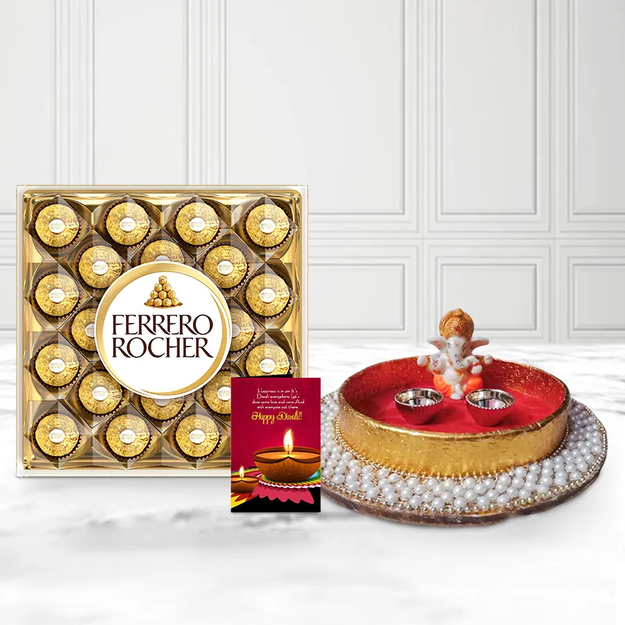 Cheerful Diwali Hamper featuring a Ganesh Idol, Designer Pearl Puja Thali, box of Ferrero Rocher chocolates, and a Diwali wishing card.