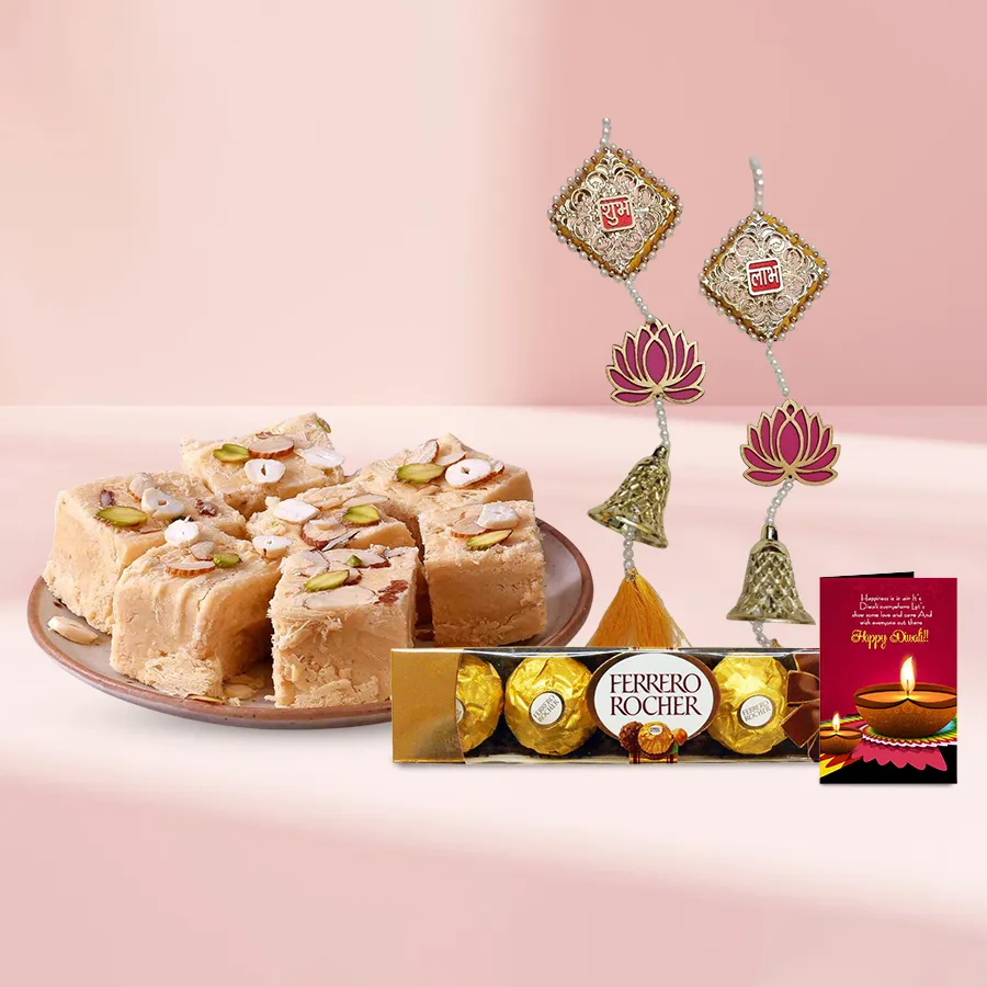 Exuberant Elegance Diwali Gift Combo featuring Shubh Labh Torans, Soan Papdi, Ferrero Rocher chocolates, and a Diwali Wishing Card