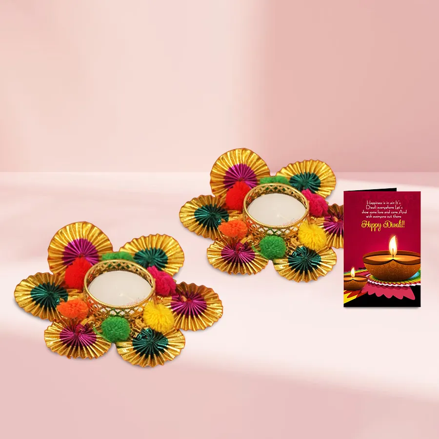 Set of 2 Pom-pom Designer Diyas for Deepavali featuring colorful pom-pom accents and a Diwali Wishing Card.