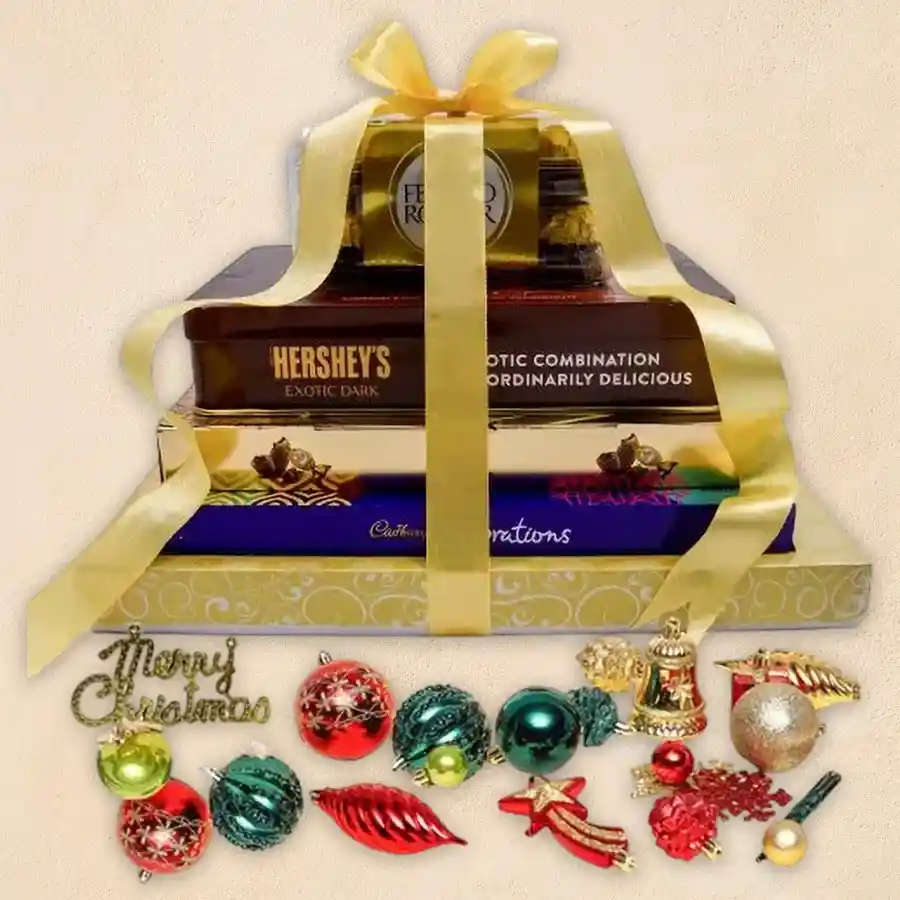 Tempting Xmas Chocolate Tower featuring assorted chocolates and a festive decoration box