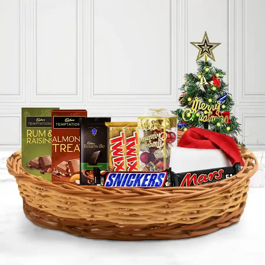 Christmas Chocolate Fun Feast Basket filled with assorted chocolates, festive decorations, and a reusable gift basket.