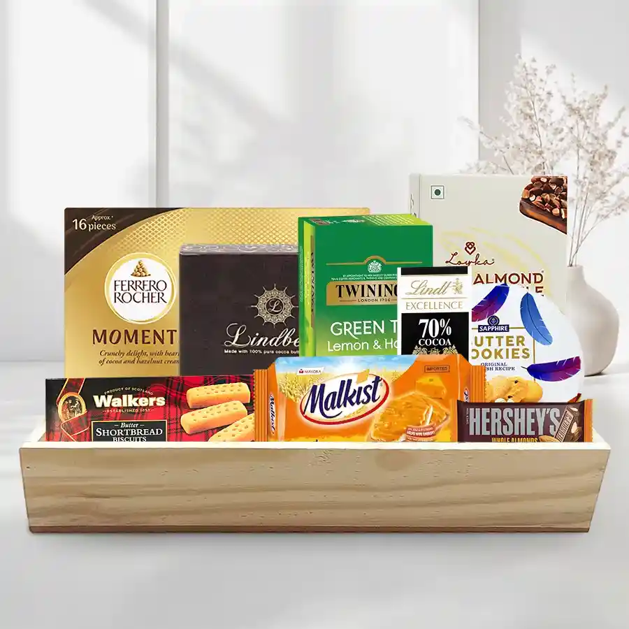 Luxurious Gourmet Treat X-Mas Tray with assorted cookies, chocolates, tea, crackers, and a wooden tray