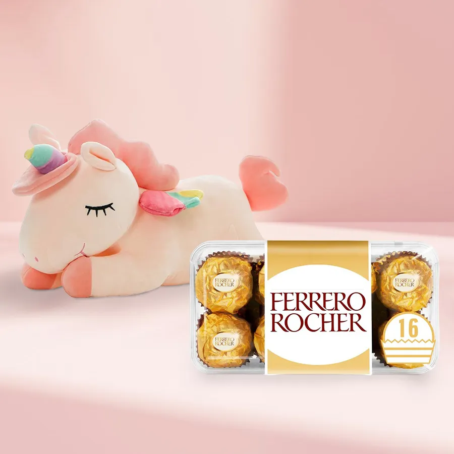Lovely Unicorn Soft Toy and Ferrero Rocher chocolate box combo on a light background
