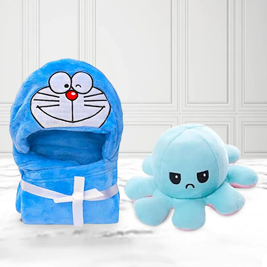 Adorable blue octopus plush toy beside a soft bath towel designed for kids, showcasing a whimsical bath time combo set.