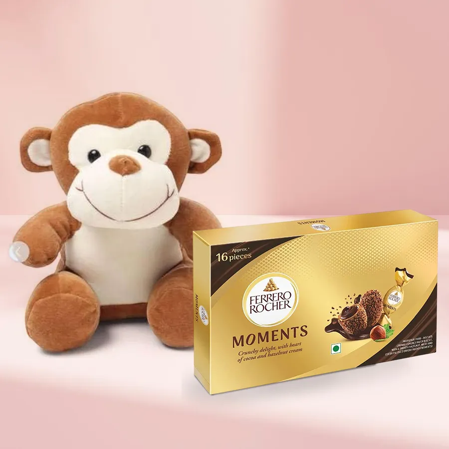 Monkey stuffed toy and Ferrero Rocher chocolates in a gift set.
