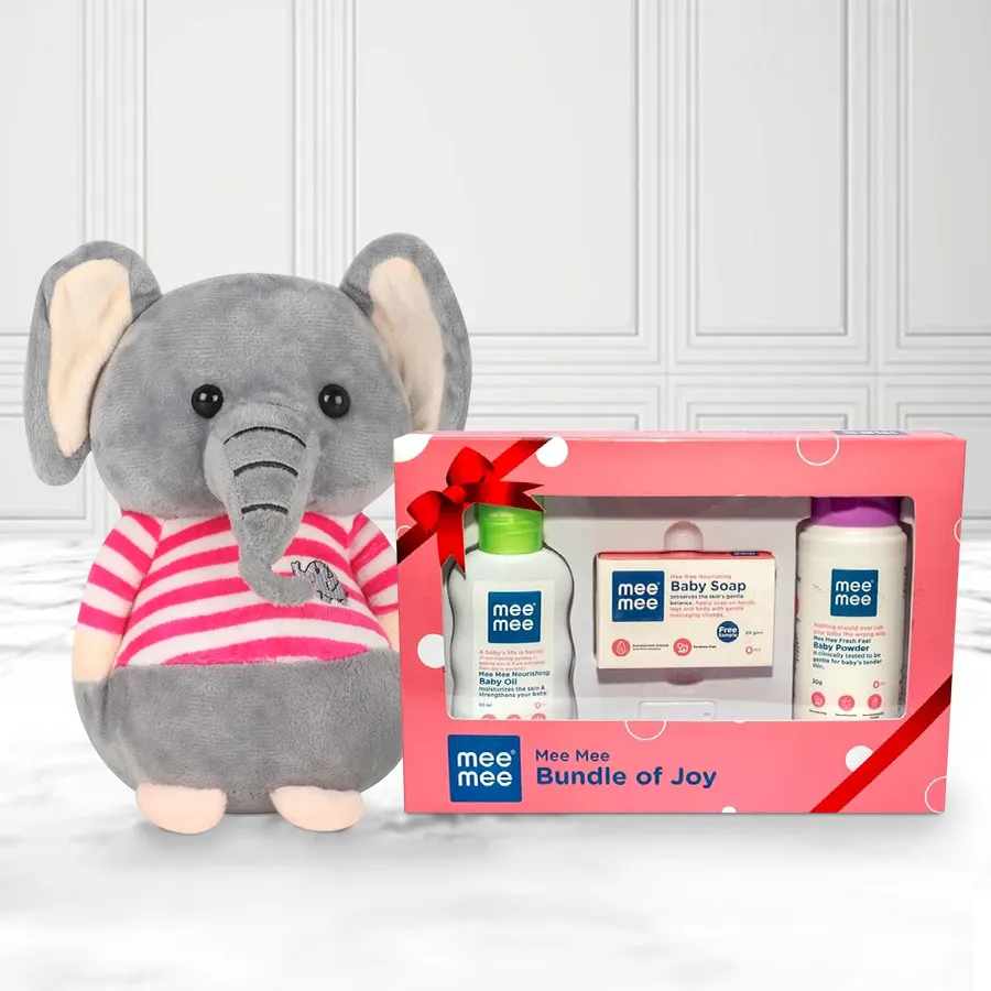 Cute grey elephant soft toy next to Mee Mee Baby Care Set, perfect for children aged 18 months to 6 years.