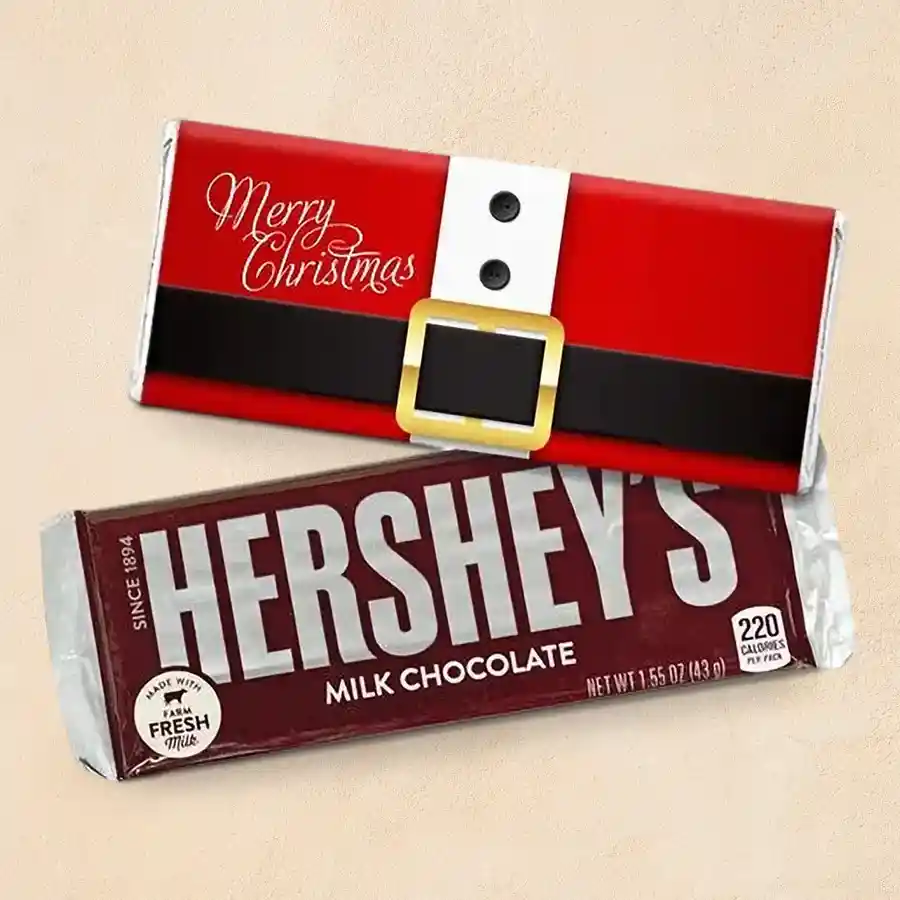 Personalized Santa-themed Christmas chocolate bar with custom photo packaging and Hershey's Kisses inside.