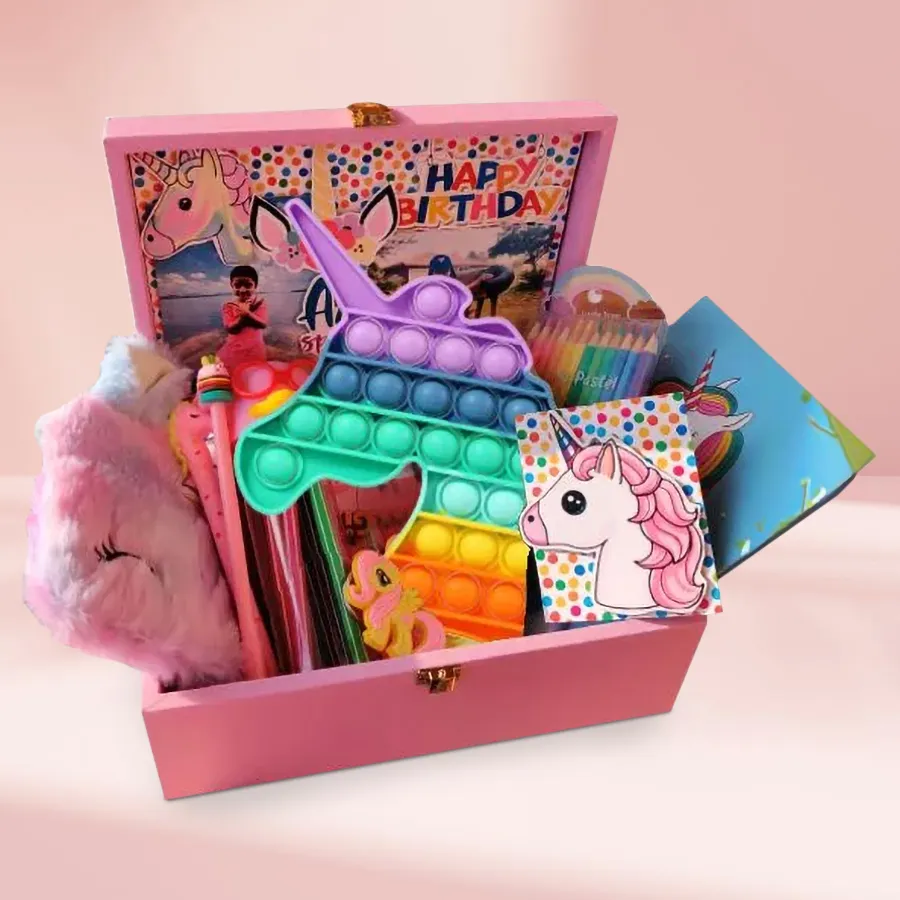 Marvelous Coloring Kit featuring Unicorn Assortments, including a Unicorn Popit, eye mask, pencil sets, eraser, crayons, unicorn card, assorted chocolates, and a pink chest box.