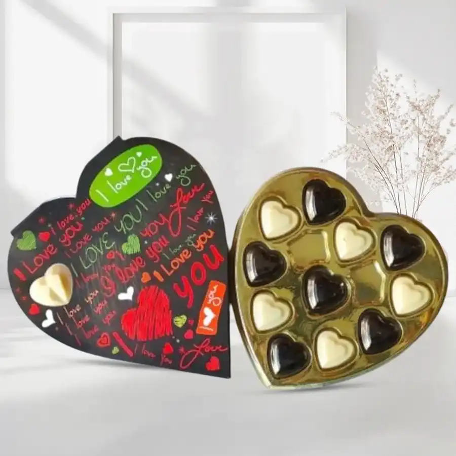 Exotic homemade heart-shaped chocolates in a decorative box, perfect for Valentine's Day gifting.