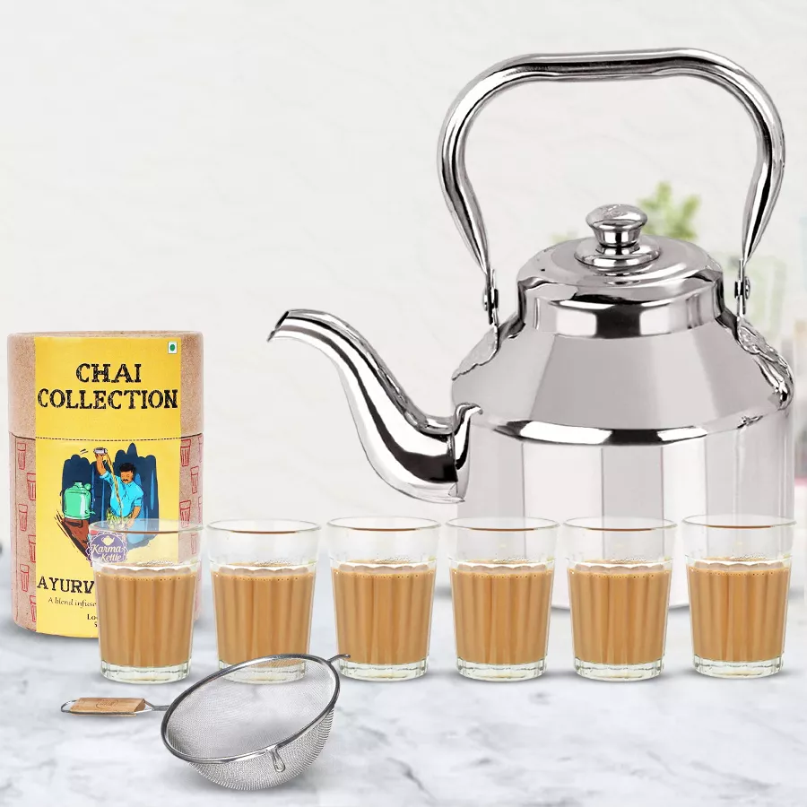 Ayurvedic tea set including stainless steel kettle, six tea glasses, strainer, and 50g tea package