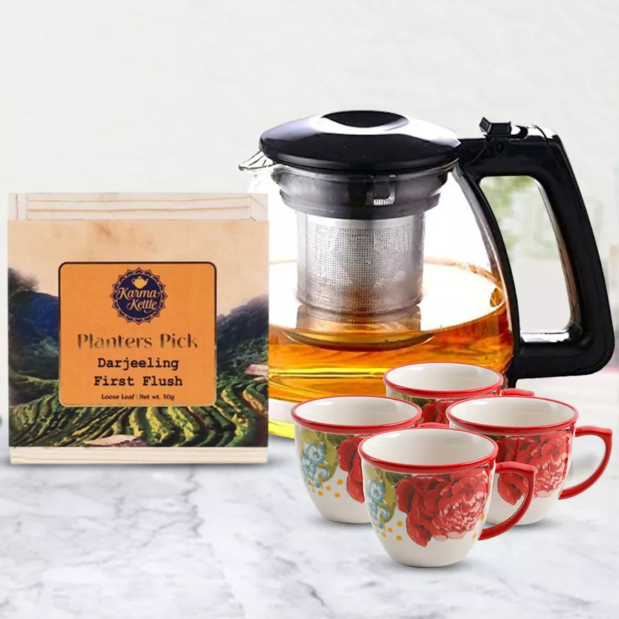 Premium Darjeeling First Flush Tea set featuring 50g of tea, a glass filter kettle, and a 4-piece cup set.