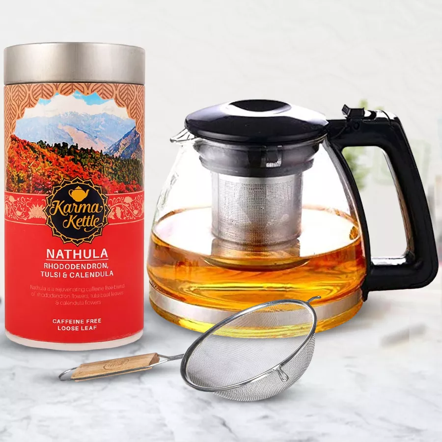 Delightful Tea Lovers Combo with tea pack, glass kettle, and stainless steel strainer