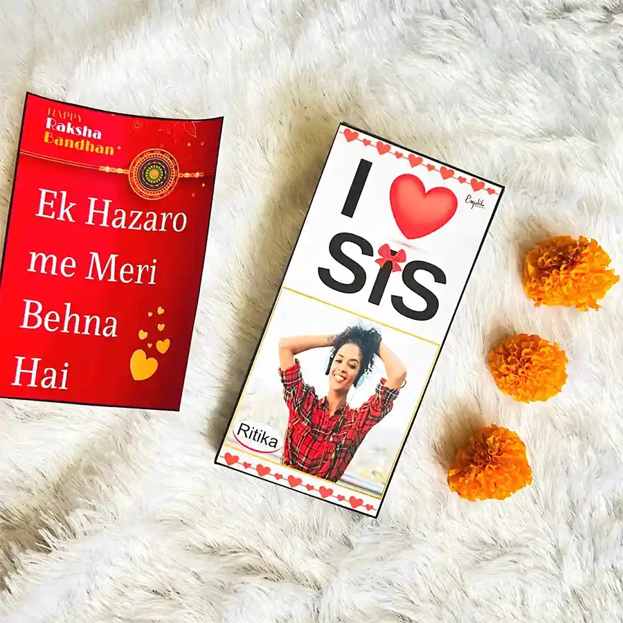 Customized chocolates and Rakhi gift box for sister featuring assorted chocolate bar, personalized design, and Rakhi greeting card.