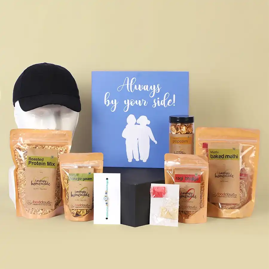 Handpicked Treat Box for Best Brother featuring Evil Eye Rakhi and assorted snacks