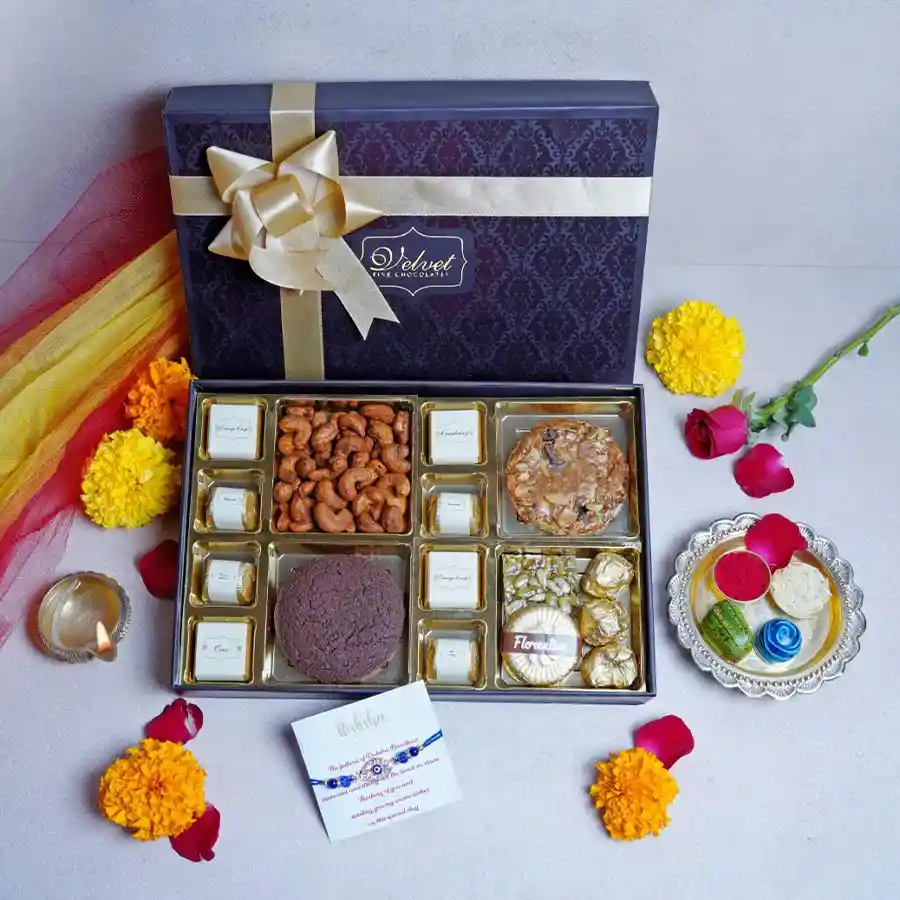 Choco Love Box featuring 8 assorted chocolates, Cajun cashews, and cookies, beautifully arranged for Raksha Bandhan celebration.