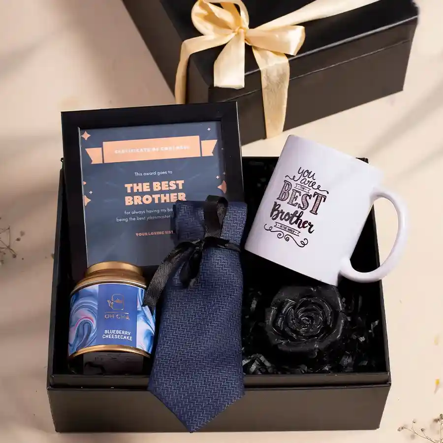 Brothers Special Gift Hamper featuring a Best Brother Award Frame, a ceramic mug, a blue tie, OH CHA Blueberry Cheesecake Tea, rose-shaped charcoal soap, all in a sleek black signature box.