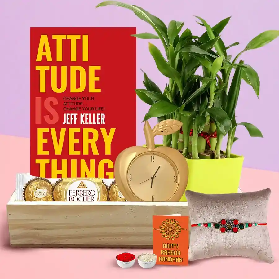 Perfect Retirement Gift Hamper featuring an inspiring book, golden apple-shaped clock, Ferrero Rocher chocolates, lucky bamboo plant, and wooden tray arranged elegantly.