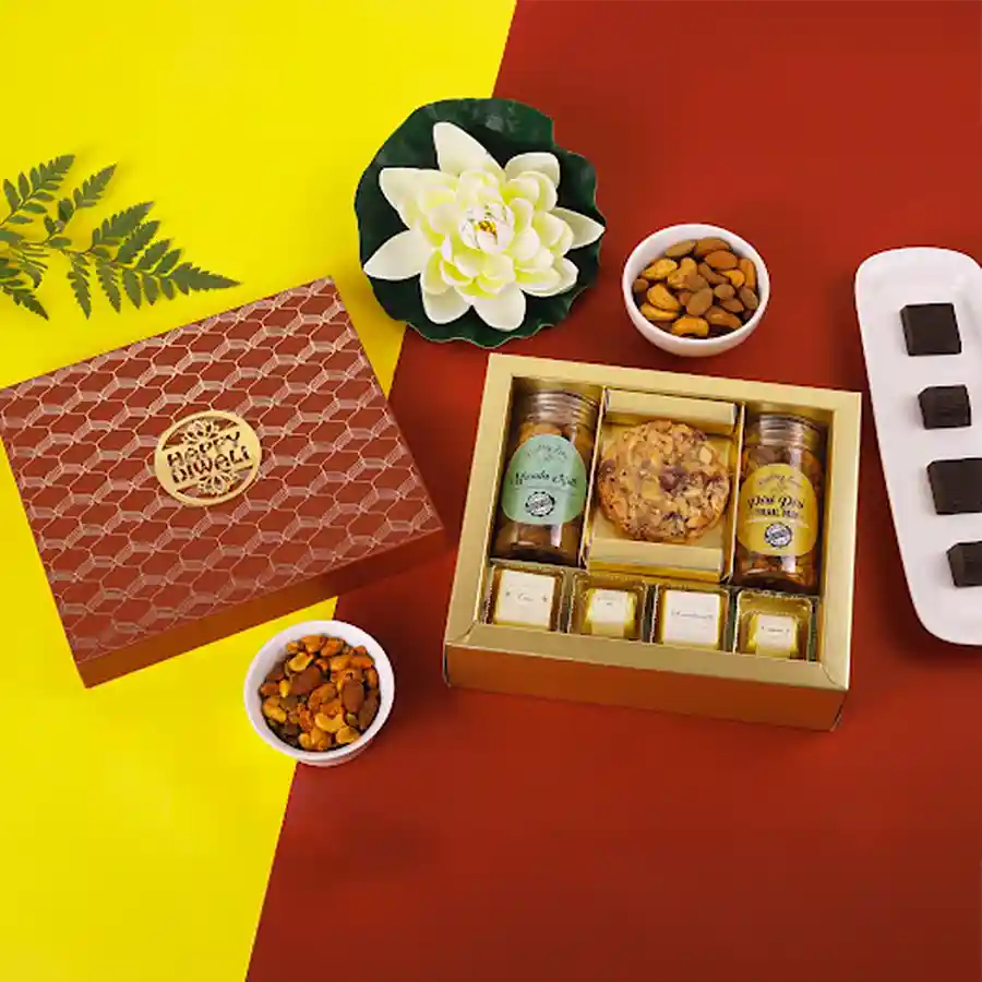 Festive Gourmet Treats Assortment box featuring chocolates, nuts, and a cookie