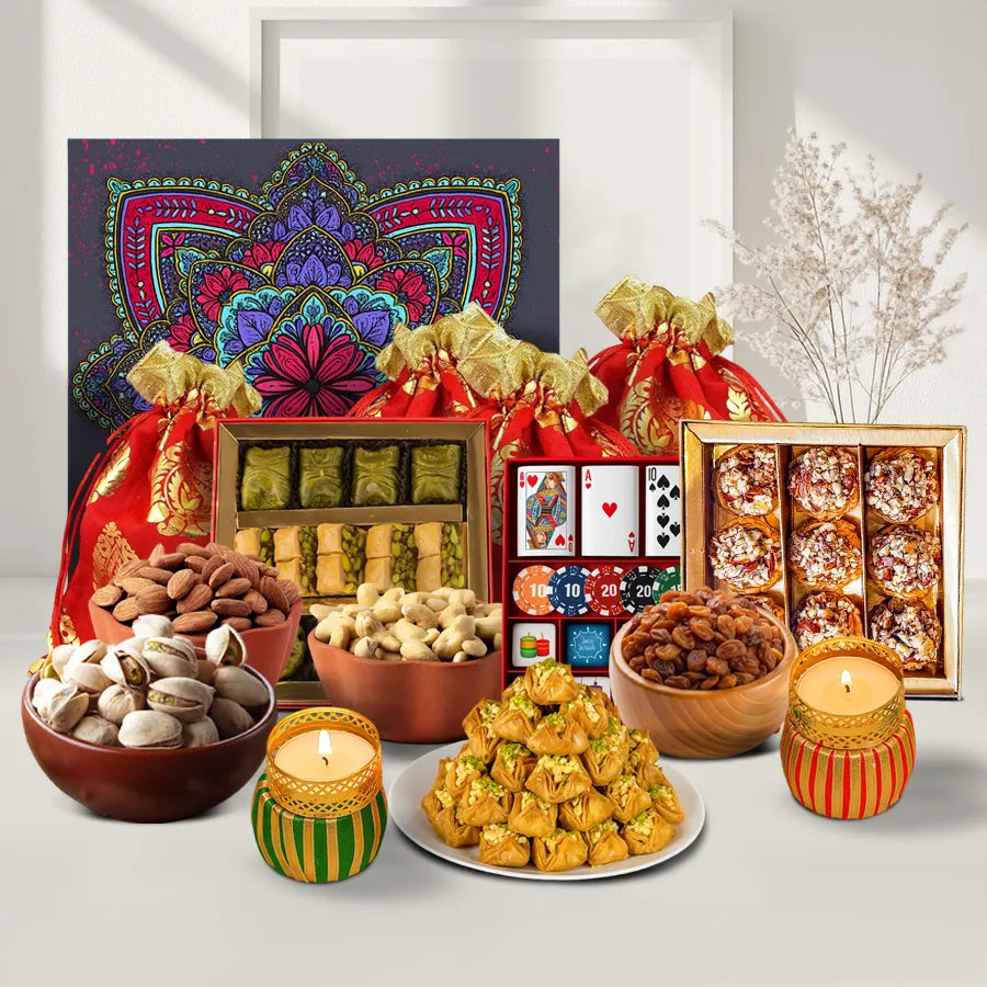 Diwali Gourmet Celebration Box featuring potlis of nuts, baklawa, playing card-shaped chocolates, T-light candles, and a Festive Mandala box.