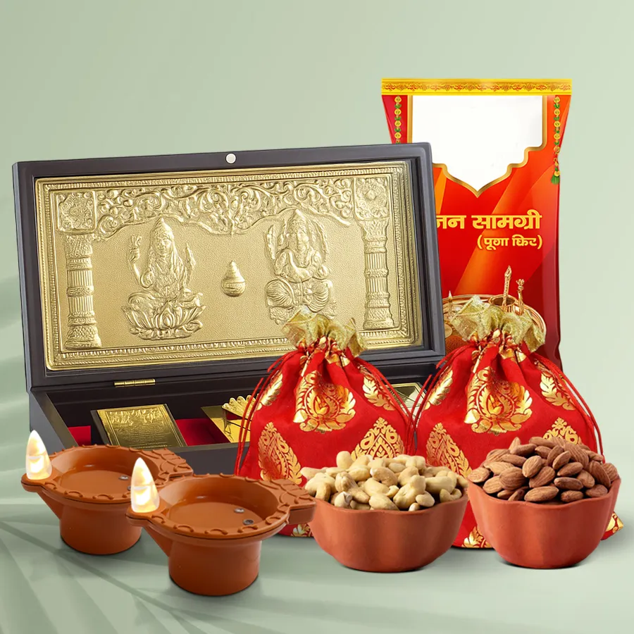 Radiant Diwali Puja Essentials Tray featuring Ganesh Lakshmi Charan Paduka Prayer Box, designer potlis with cashews and almonds, Puja Samagri Pack, and eco-friendly water LED diyas.