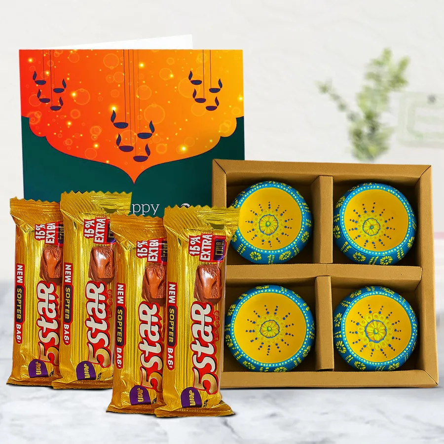 Perfect Diwali Gift Set featuring clay diyas, Cadbury 5 Star chocolates, and a Happy Diwali card