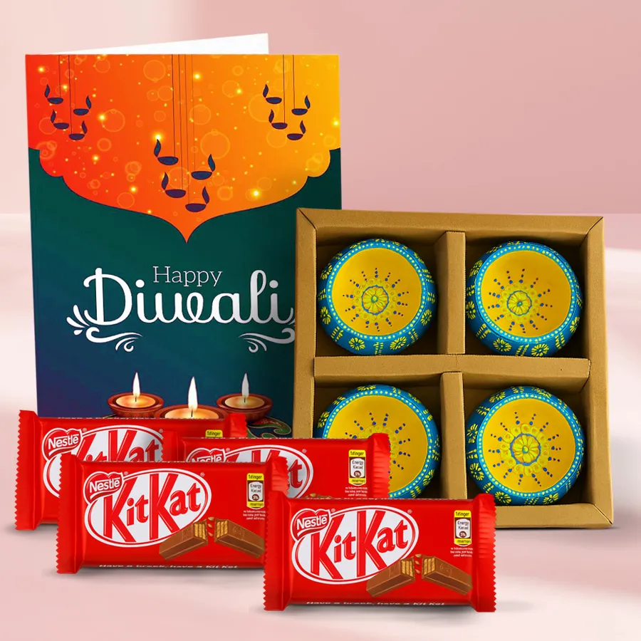 Choc o Lights Diwali Sparkle Box featuring 4 clay diyas, Nestle KitKat chocolates, and a Happy Diwali greetings card