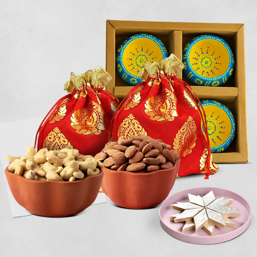 Ultimate Diwali Surprise Gift Box with cashews, almonds, Kaju Katli, and handcrafted clay diyas in designer jute potlis