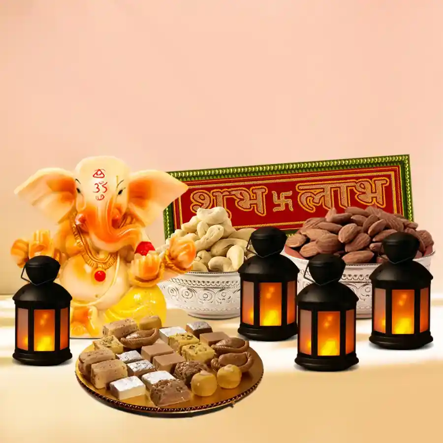 Royal Diwali Elegance Collection hamper featuring assorted sweets, premium nuts in silver-plated bowls, lantern-shaped LED lights, Vignesh Ganesh idol, and Subh Labh stickers.