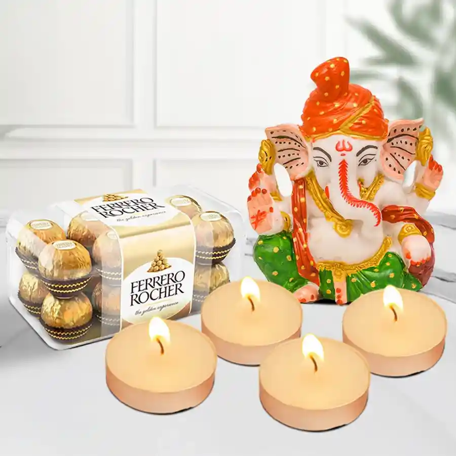 Glorious Gifts Hamper for Diwali featuring a Polyresin Pagdi Ganesh Idol, a 16-piece Ferrero Rocher Gift Pack, and 4 scented T-Light Candles.