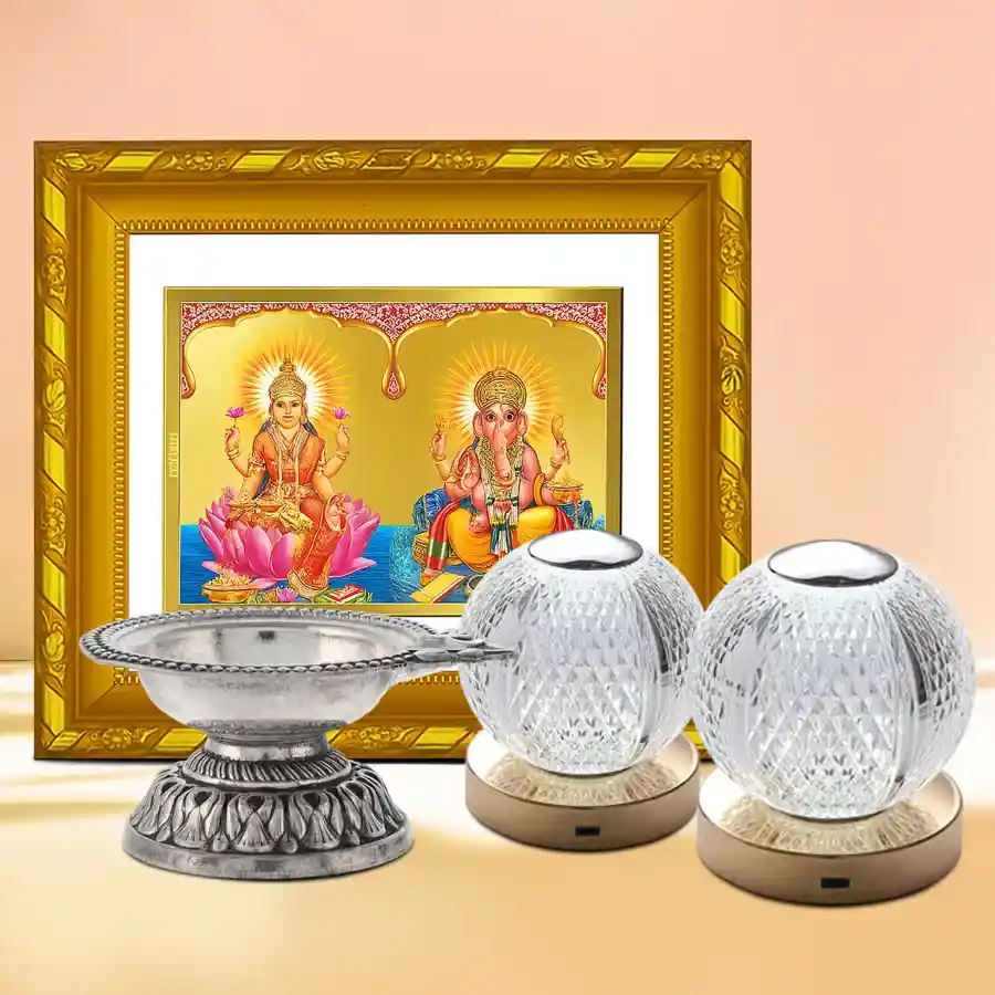 Diwali Delightful Essence Hamper featuring a Ganesh Lakshmi photo frame, silver-plated designer diya, and crystal LED light sets