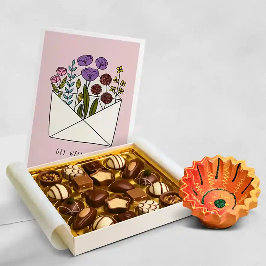 Diya and handmade chocolates in a festive hamper for Diwali celebration