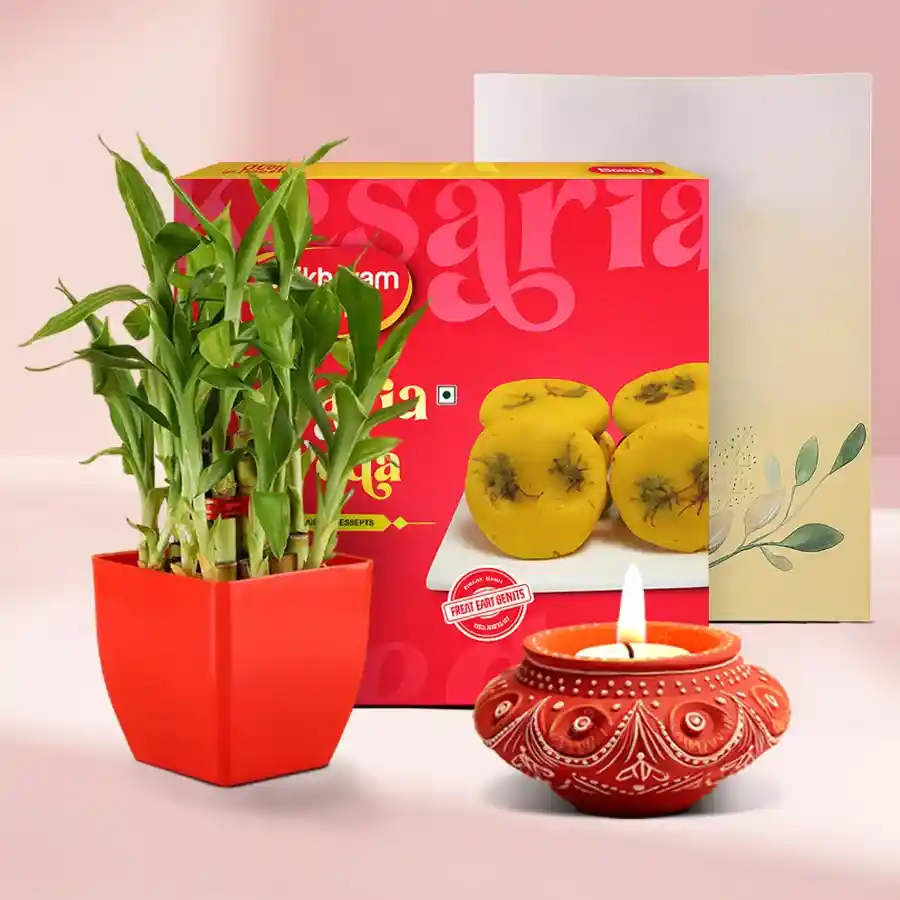 Lucky Bamboo plant, Kesar Laddu sweets, Diya, and personalized message card for Diwali celebration.