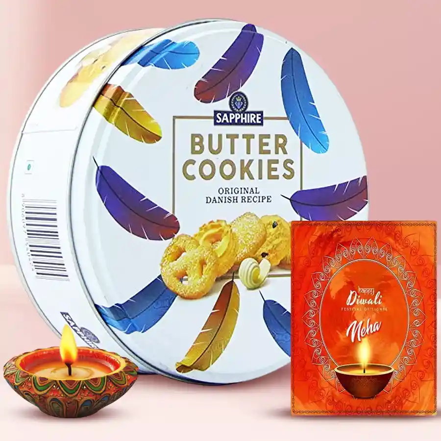Diwali hamper featuring a diya, Sapphire Butter Cookies, and a personalized message card