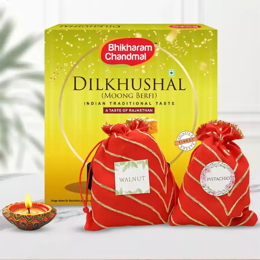 Pistachios, walnuts, and a decorative Diya hamper for Diwali celebrations