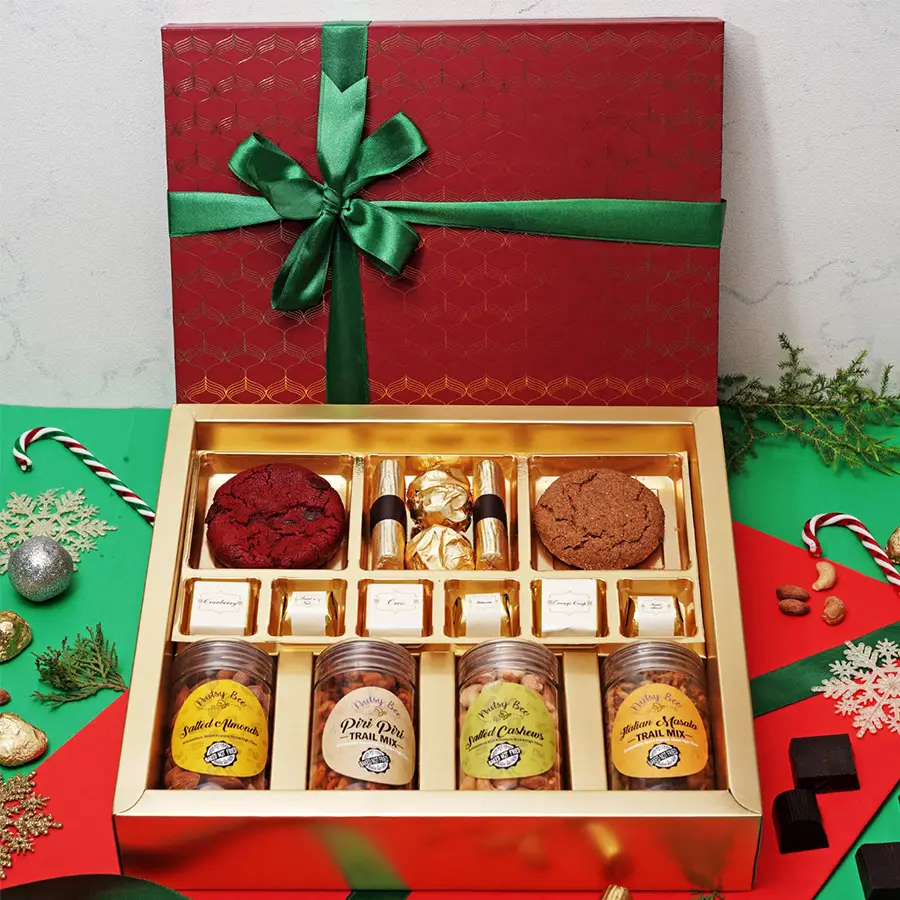 Flavors of Joy Gift Box with assorted cookies, chocolates, and gourmet snacks
