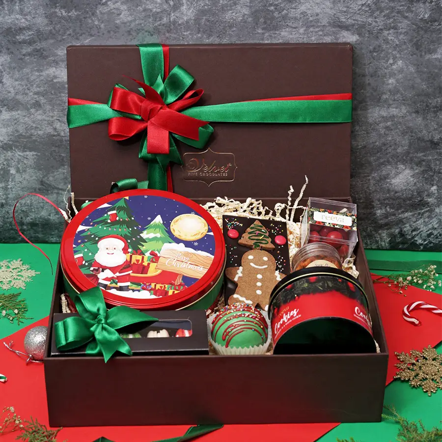 Festive Chocolate Symphony Hamper with cranberry dragees, Piri Piri trail mix, snickerdoodle cookies, hot chocolate bomb, macarons, plum cake, and almond finger