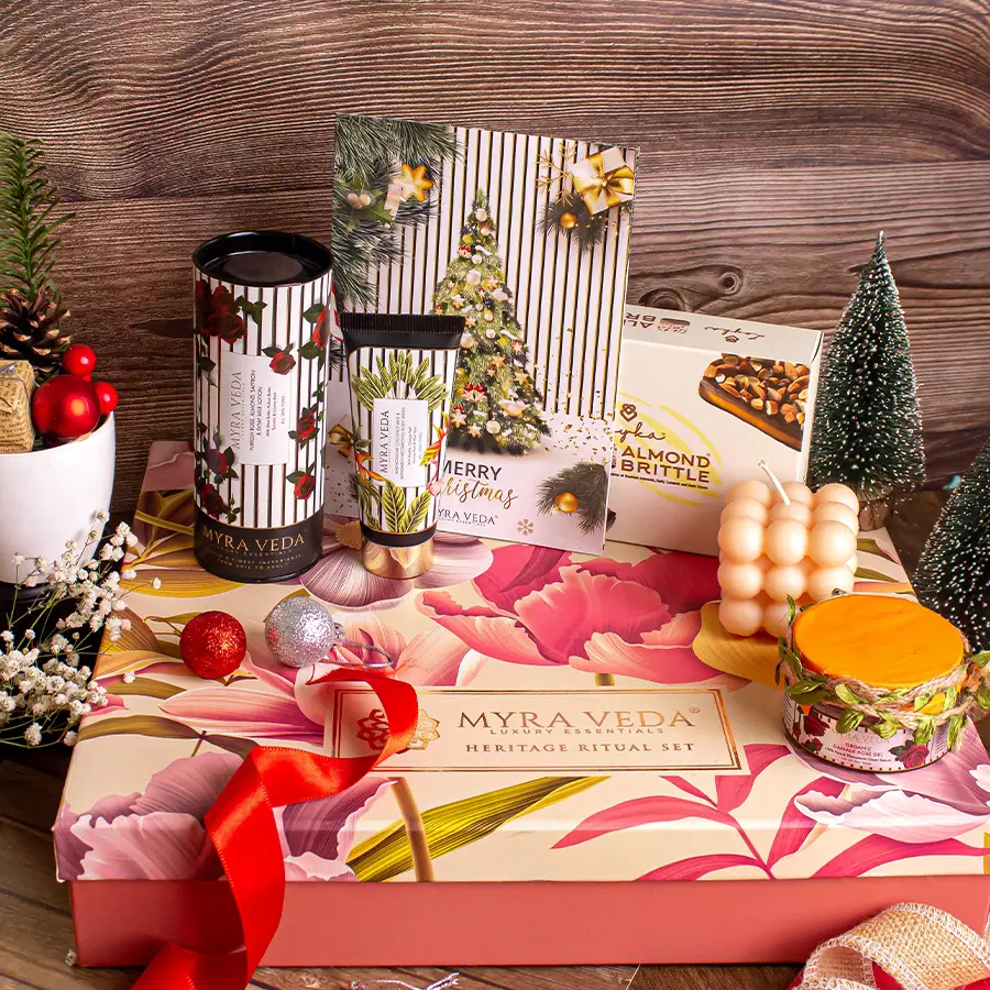 Amazing Skincare N Treats Gift Set featuring Turkish Rose Lotion, Madagascar Coconut Milk Body Wash, Organic Soya Wax Candle, Organic Face & Neck Gel, and Almond Brittle Chocolate in a beautifully wrapped box.