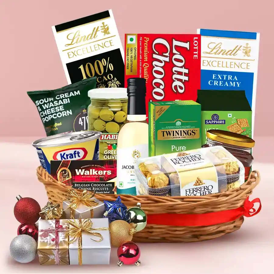 Christmas gift hamper filled with gourmet treats, chocolates, and festive decorations.